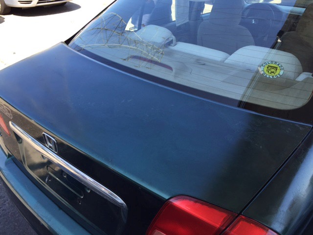 car paint oxidation. faded and oxidized car paint