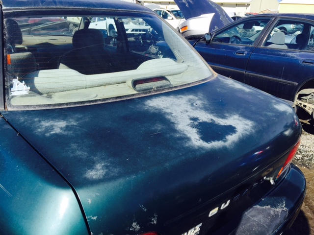 car paint oxidation. faded and oxidized car paint